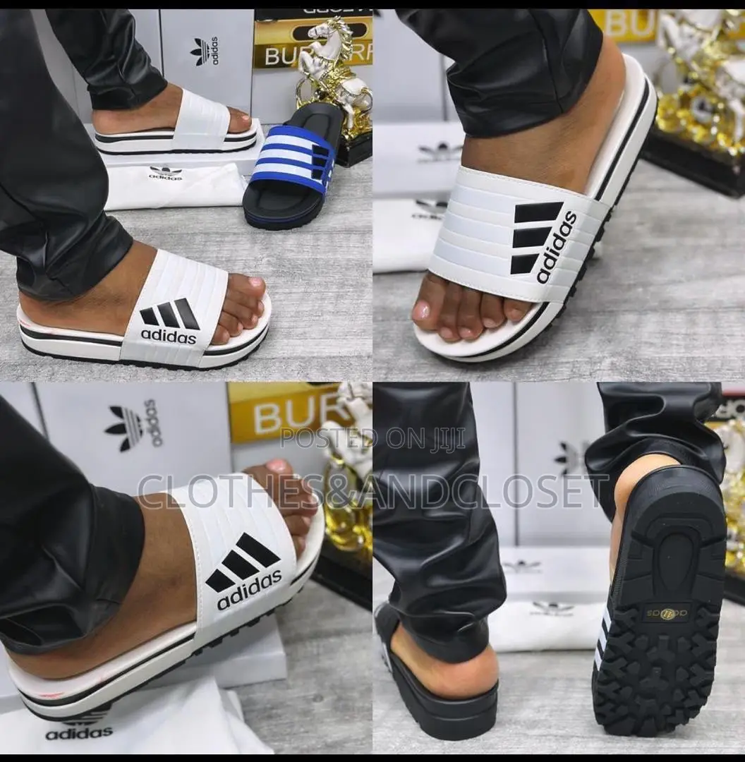 Adidas Slides,three-Stripe Bandage Upper and a Thick Textured Outsole.