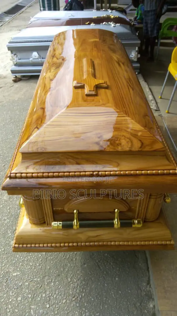 High-Gloss Wood-Finish Casket With Cross