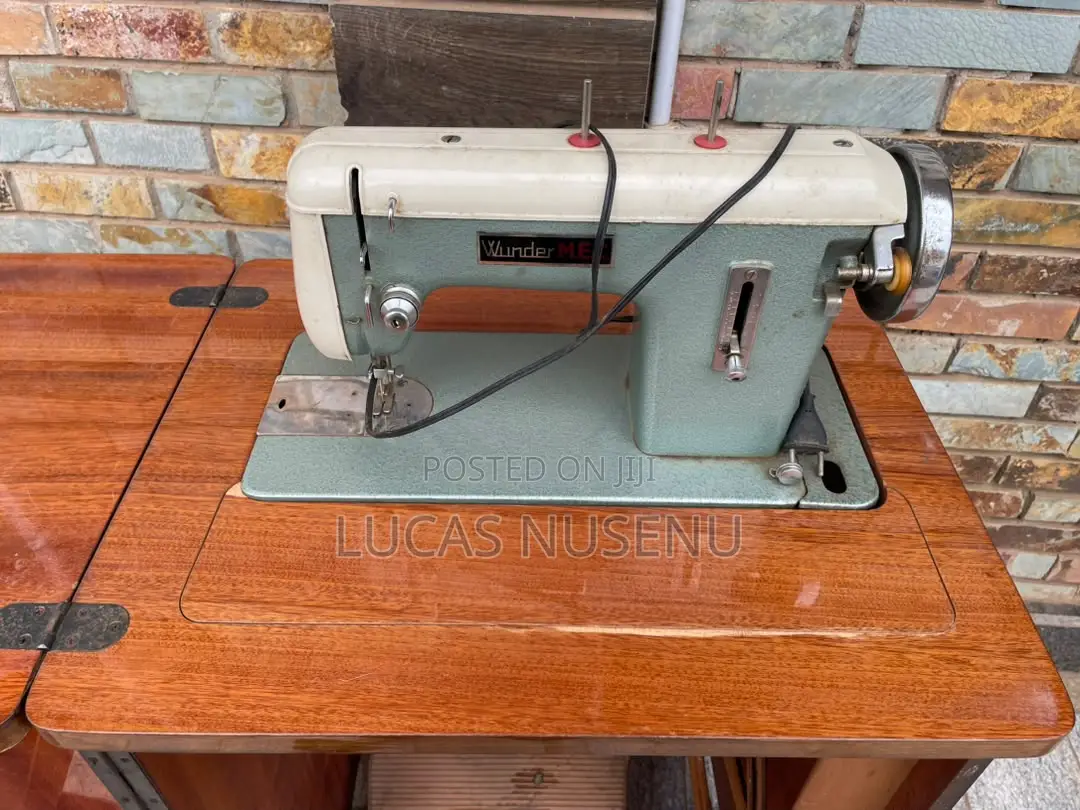 Wunder Treadle Sewing Machine With Wooden Console Cabinet