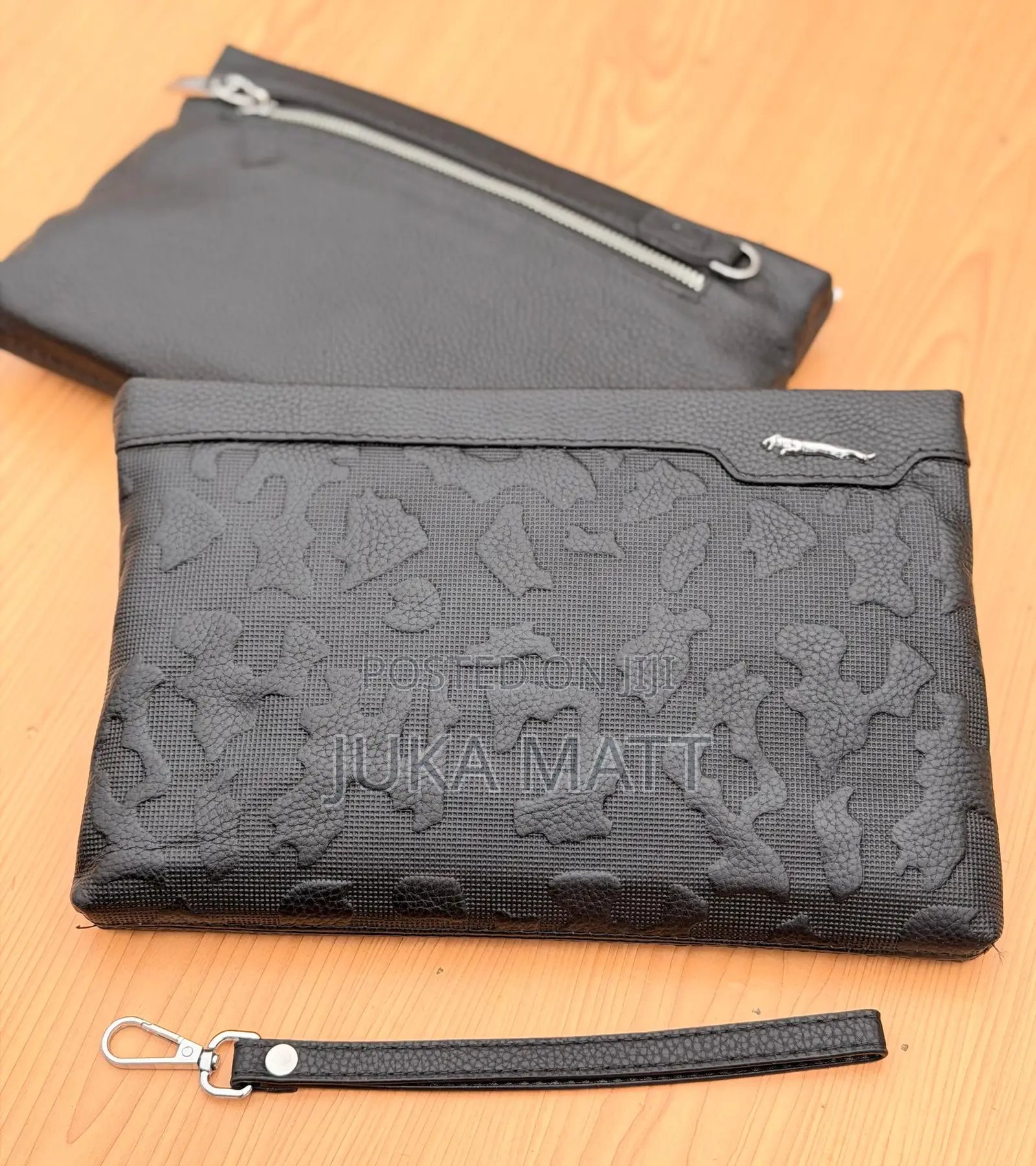 Jaguar and Other Brands Hand Pouch