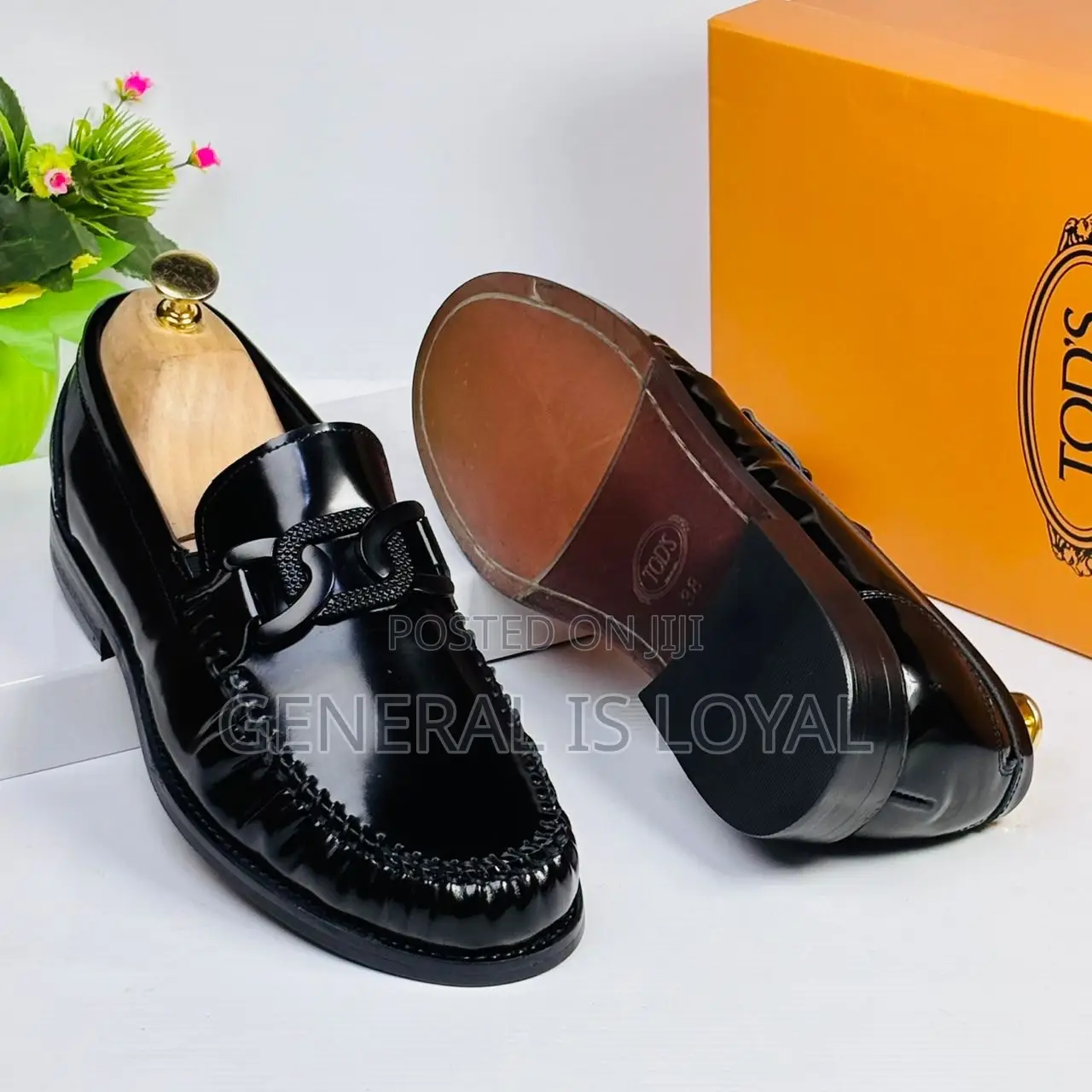 TOD’s Black Mirror Leather Loafers