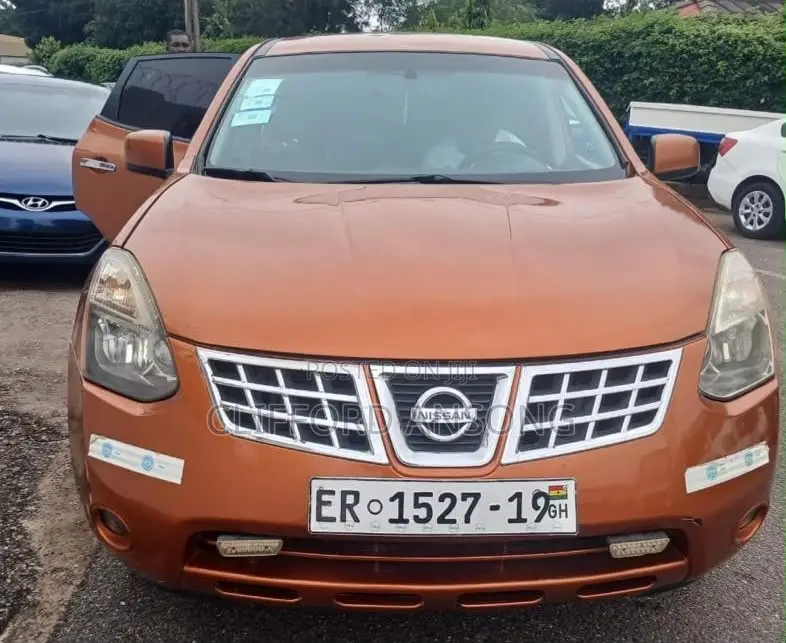 Nissan Rogue SL 2010 Orange