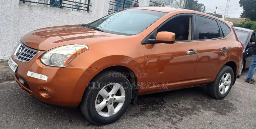 Nissan Rogue SL 2010 Orange