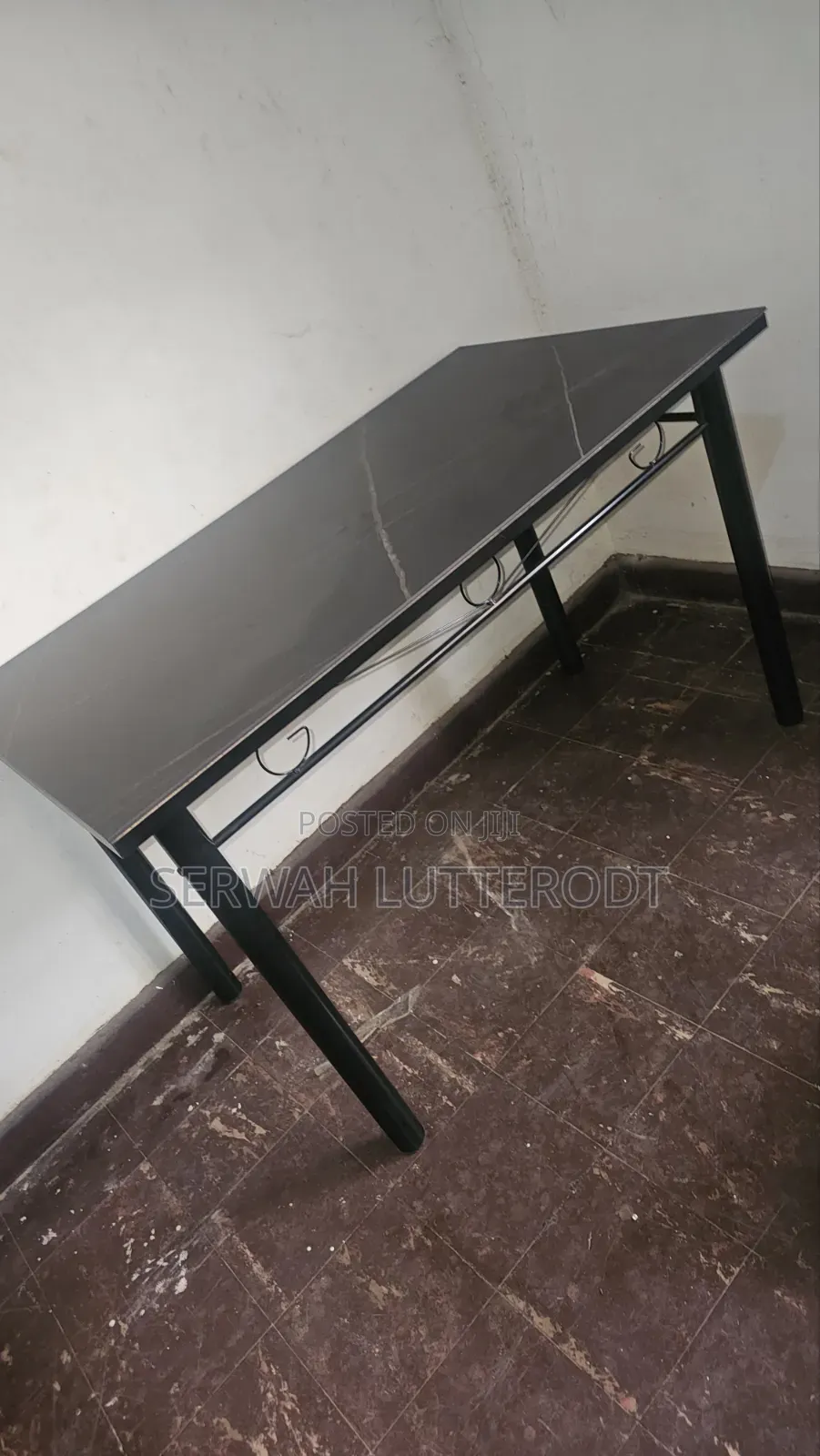 Table and 4 Chairs. (Small Chip on Side of Table)