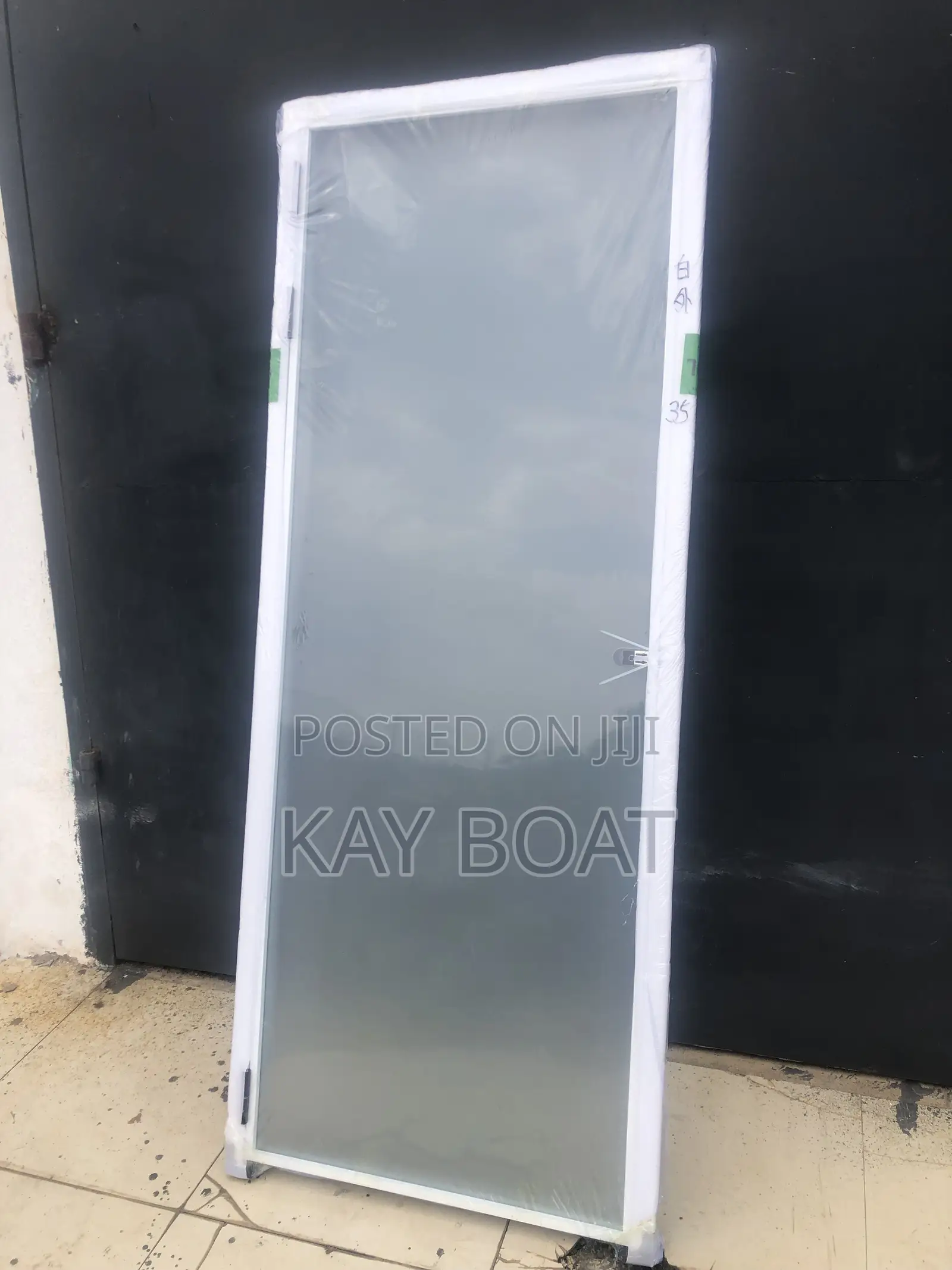 A Frosted Glass Door With Thick Glass