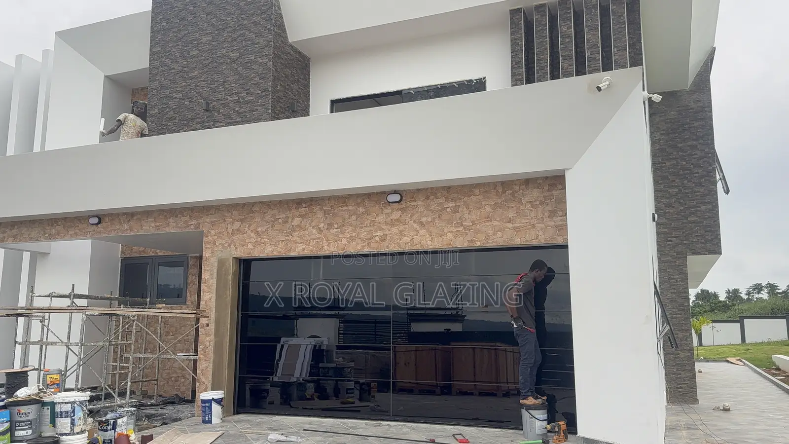 Modern Remote Control Frameless Glass Garage Door Well Installed