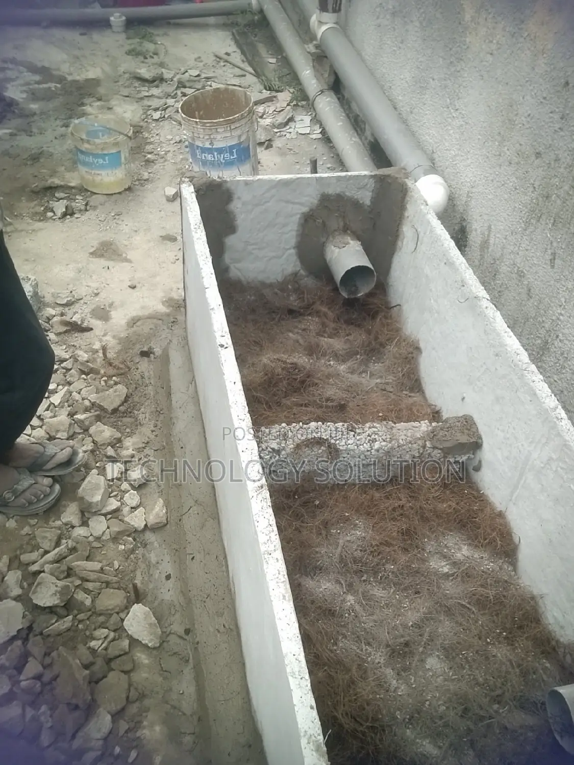 Bathroom Facility With Biodigester and Plumbing