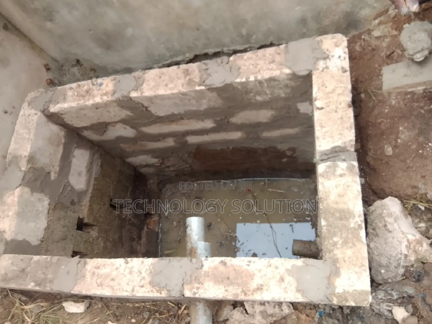 Bathroom Facility With Biodigester and Plumbing