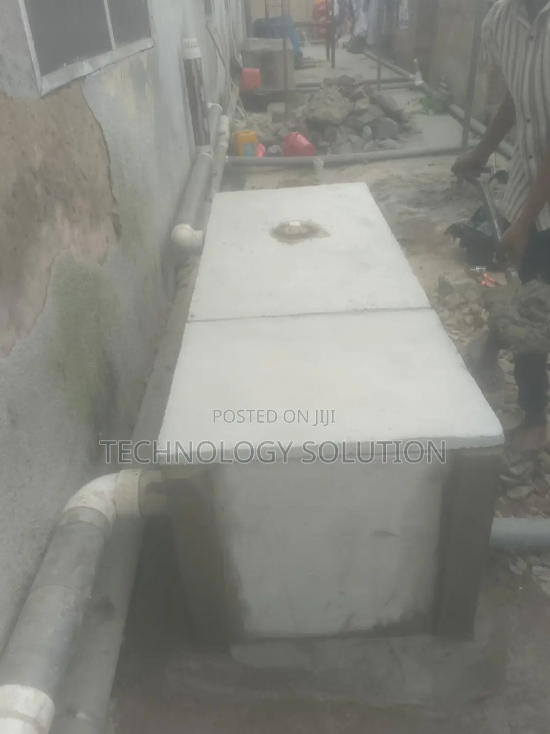 Bathroom Facility With Biodigester and Plumbing