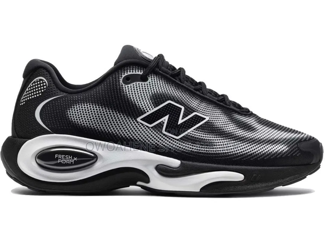 Shoes in the Image Are the Ke Runner in the Black and White Colorway.