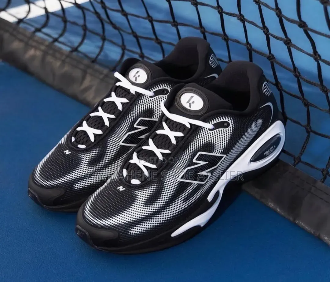 Shoes in the Image Are the Ke Runner in the Black and White Colorway.