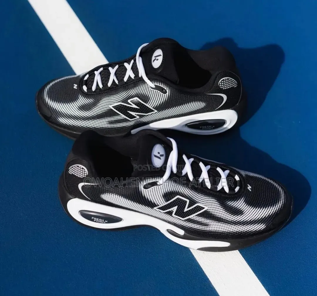 Shoes in the Image Are the Ke Runner in the Black and White Colorway.
