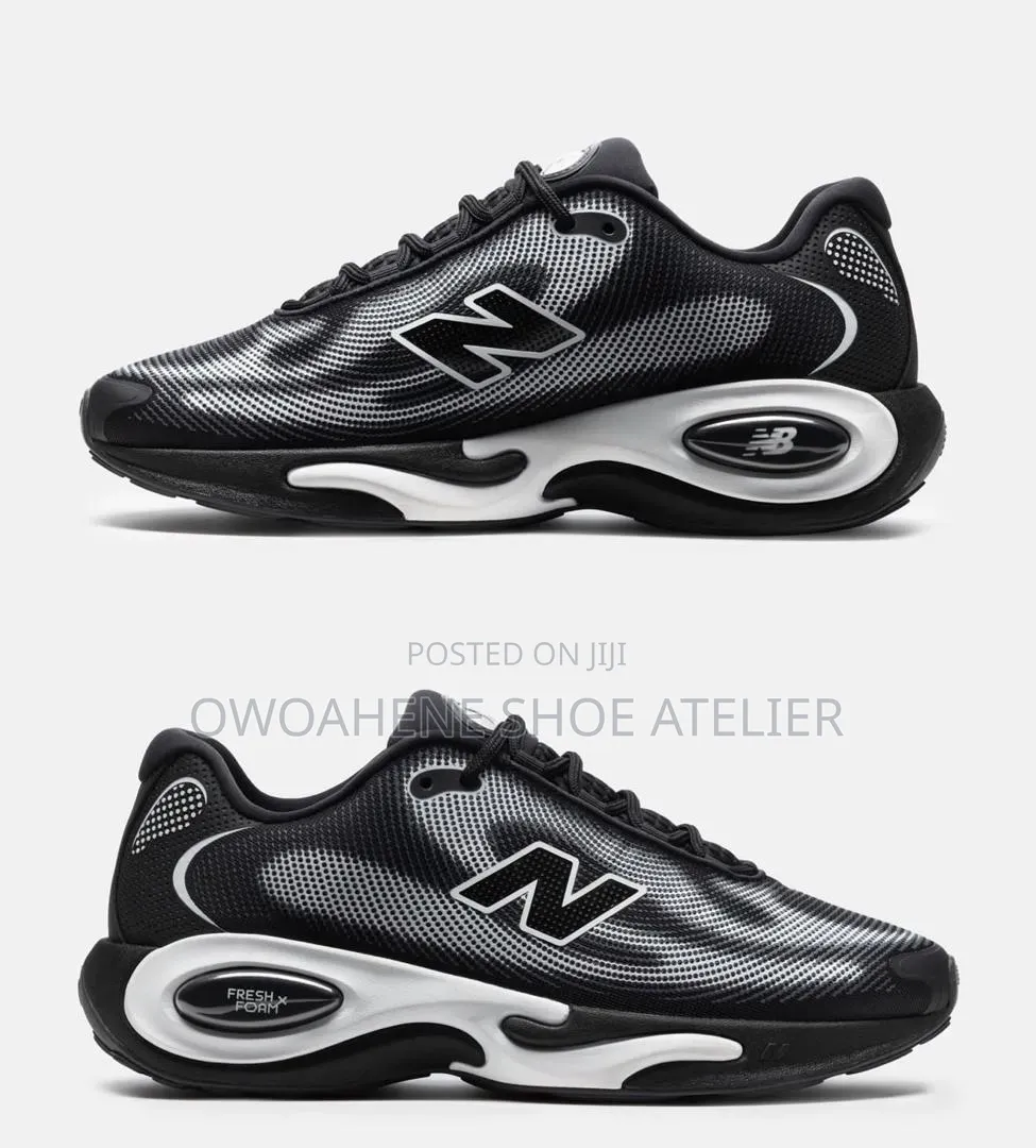 Shoes in the Image Are the Ke Runner in the Black and White Colorway.