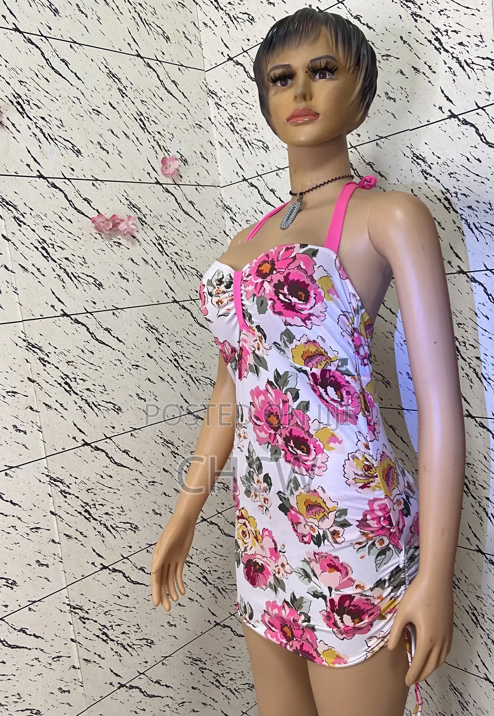 A White Jumpsuit Roper and a Colorful Beach Bikini Wear