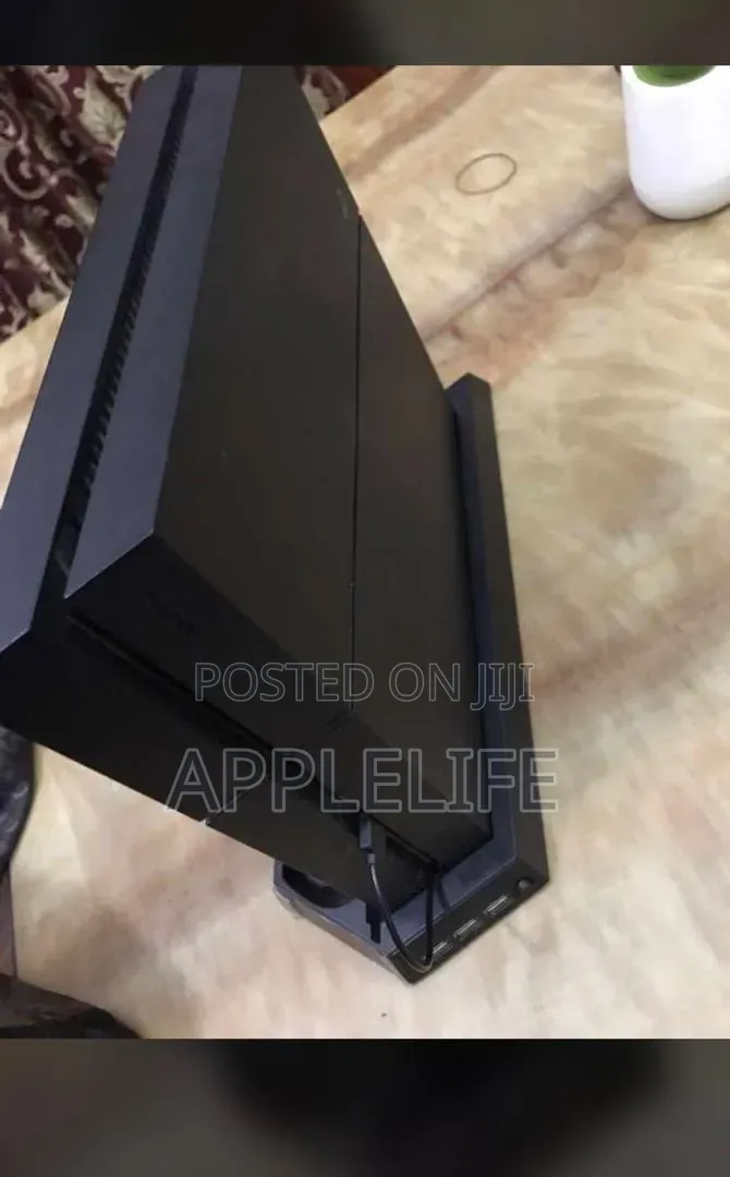 PlayStation 4 With 5 Games FIFA26 and More