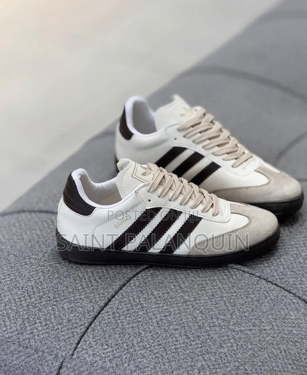 The Adidas Samba Sneakers Featuring a Clean White Leather Upper Paired