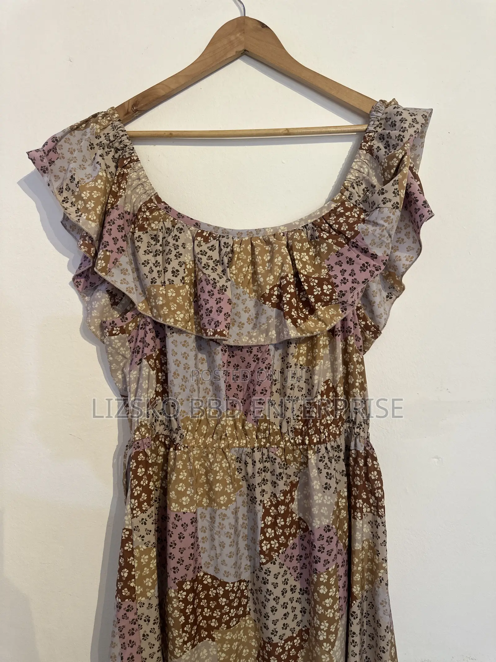 Flowy Midi Dress Featuring a Multi-Pattern Floral Print