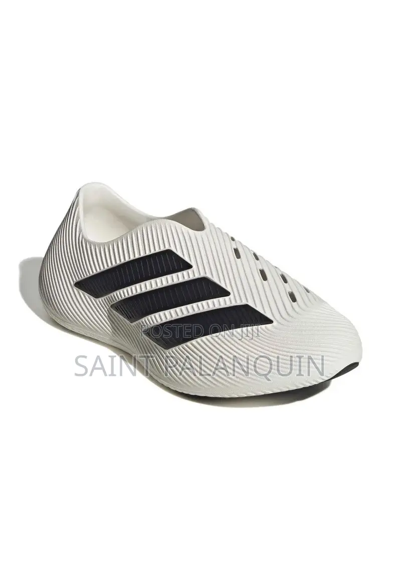 The White Adidas Purechill Slip-on Recovery Shoes a Ridged Molded