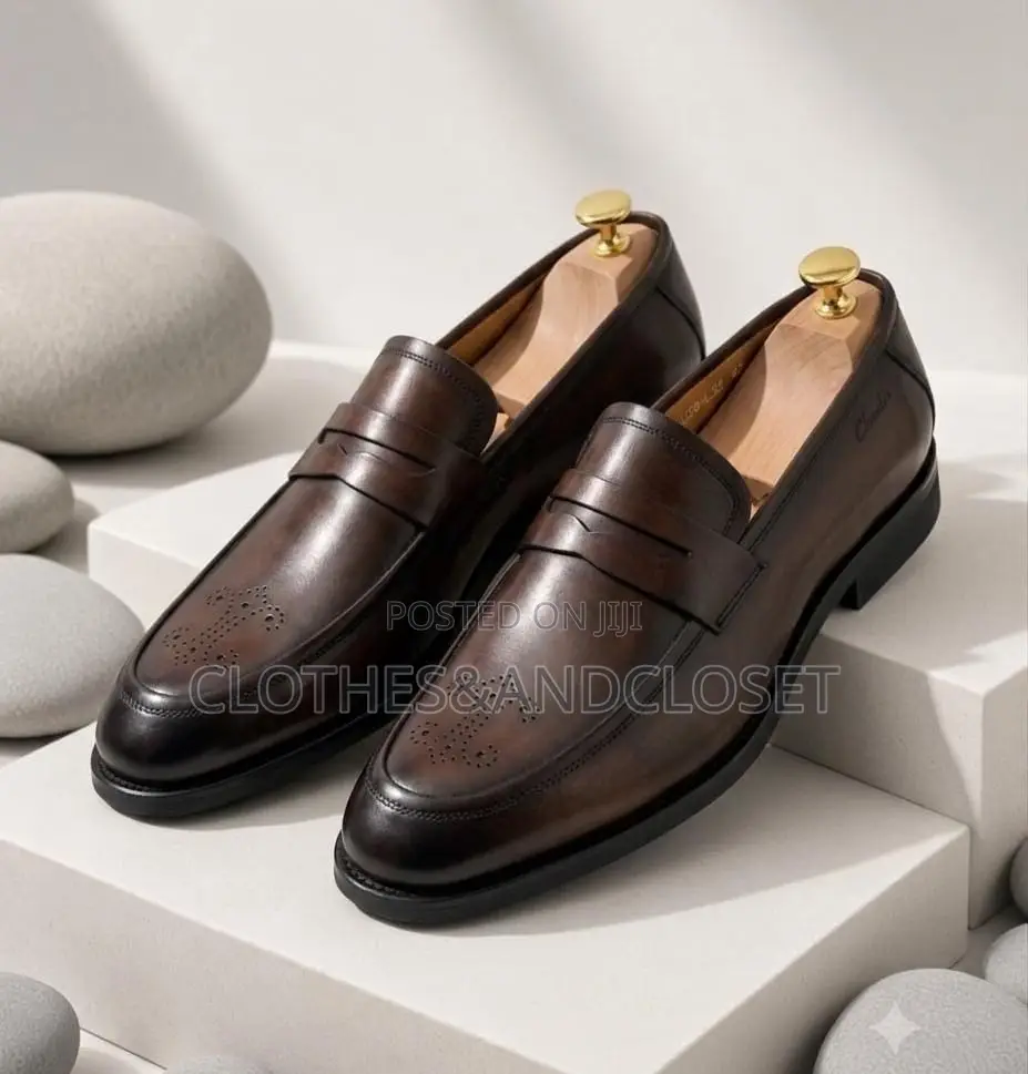 Dark Brown Leather Clarks Penny Loafers Featuring a Classic Slip-On