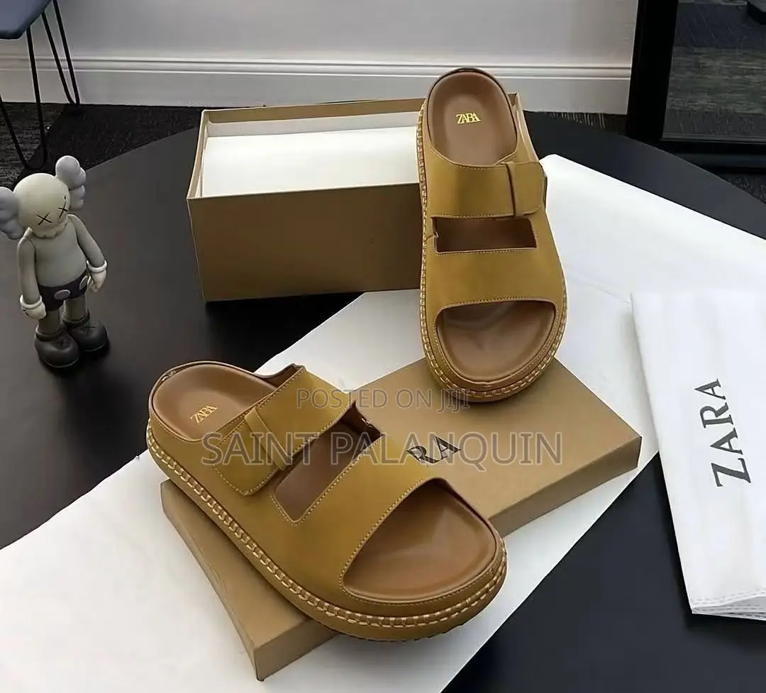 A Pair of Tan Men's Dual-Strap Leather Sandals