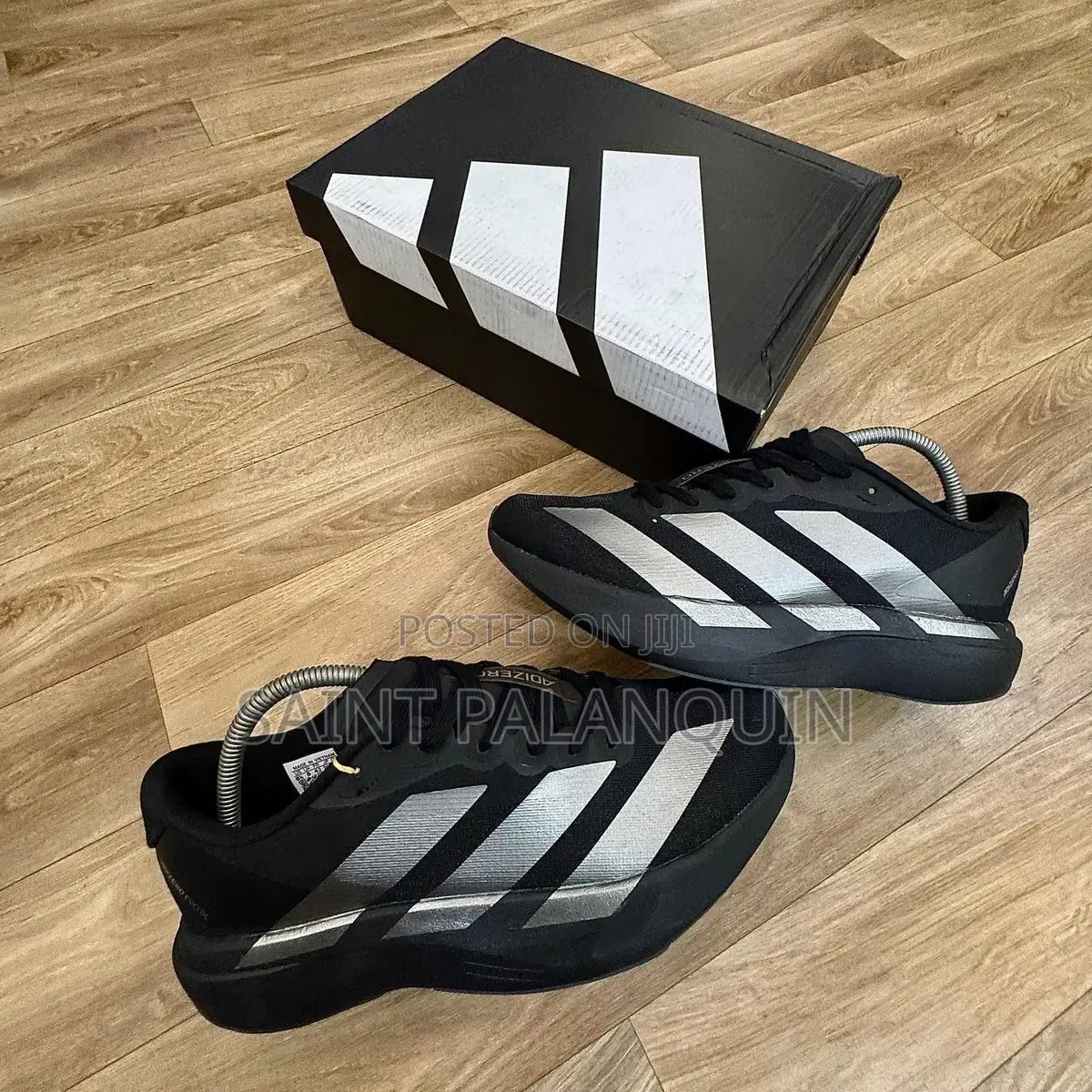 Adidas Adizero EVO SL Sneakers in Black and Metallic Silver Colorway