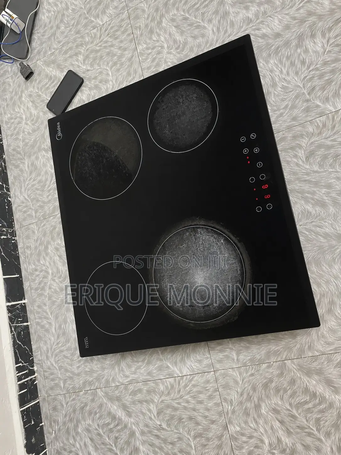 Neatly Used Electric 4 Burner Cooker.