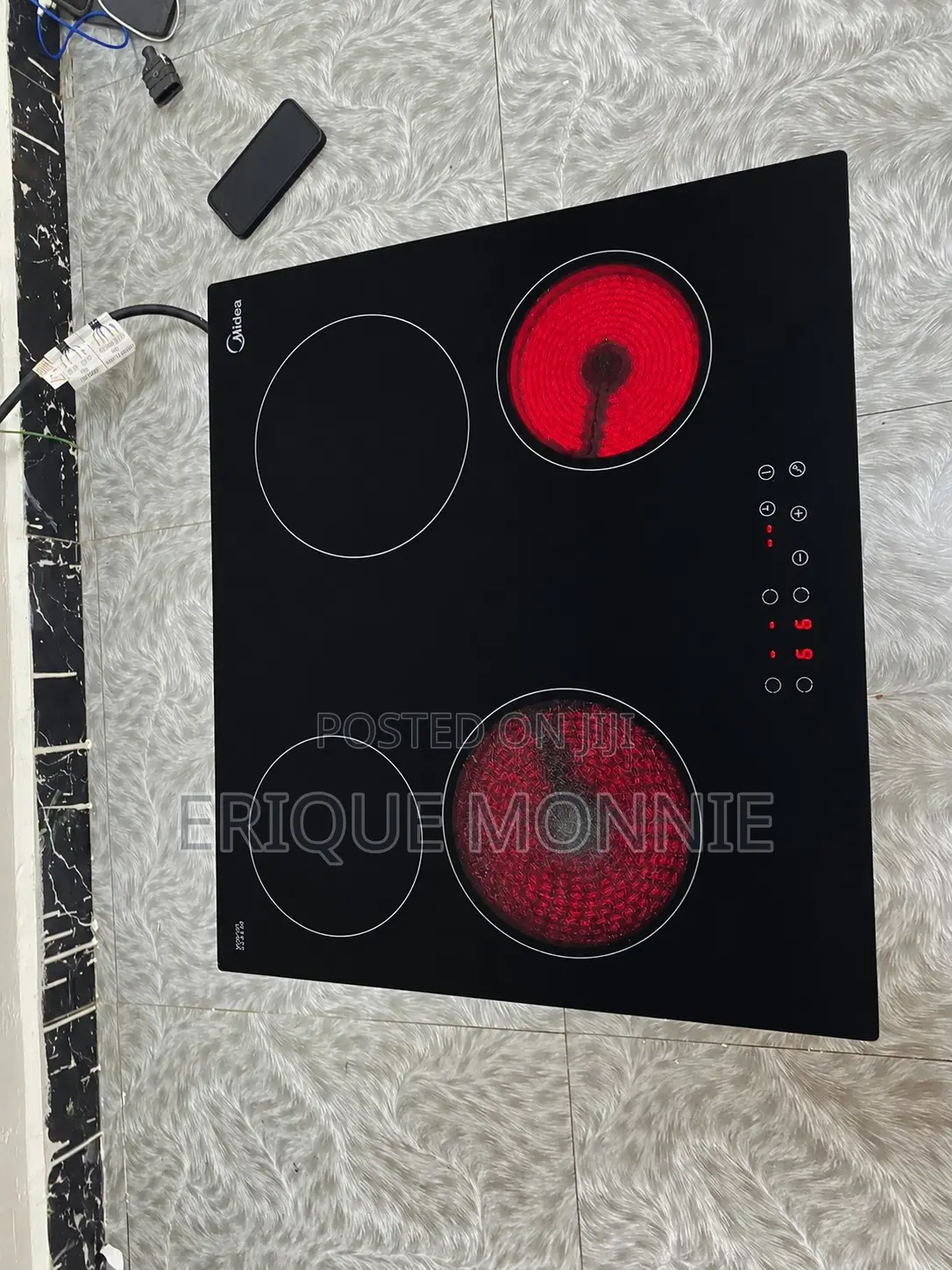 Neatly Used Electric 4 Burner Cooker.
