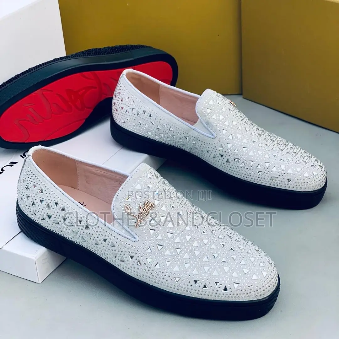 Christian Louboutin Slip-on Loafer Featuringan Intricatecutout Pattern
