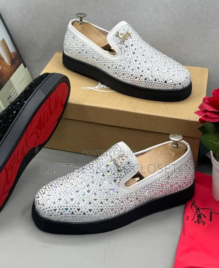 Christian Louboutin Slip-on Loafer Featuringan Intricatecutout Pattern