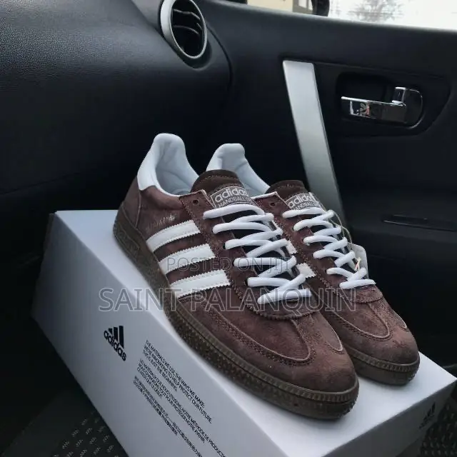 A Pair of Brown and White Adidas Handball Spezial Sneakers