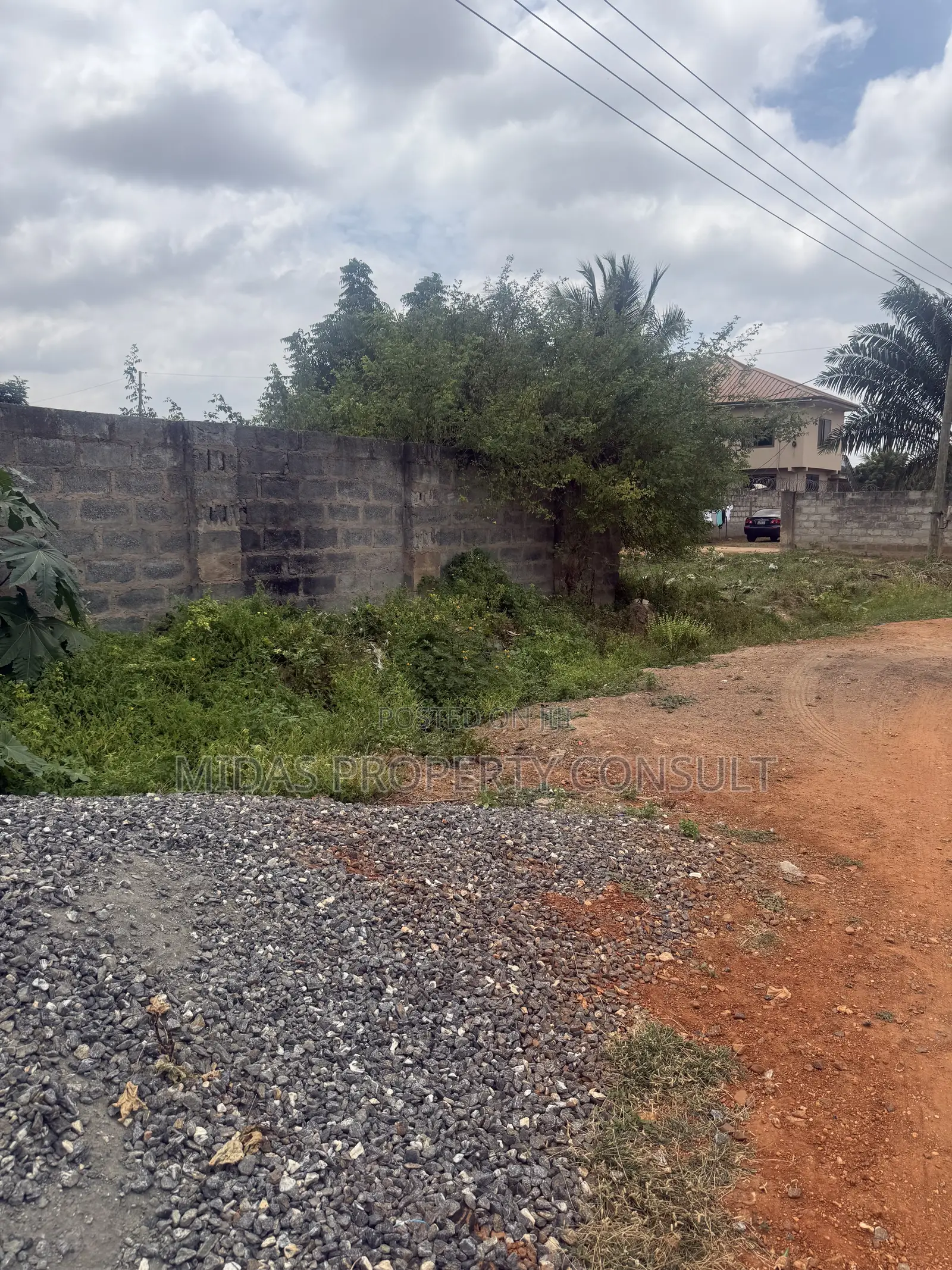140x70ft Land for Sale at Afienya
