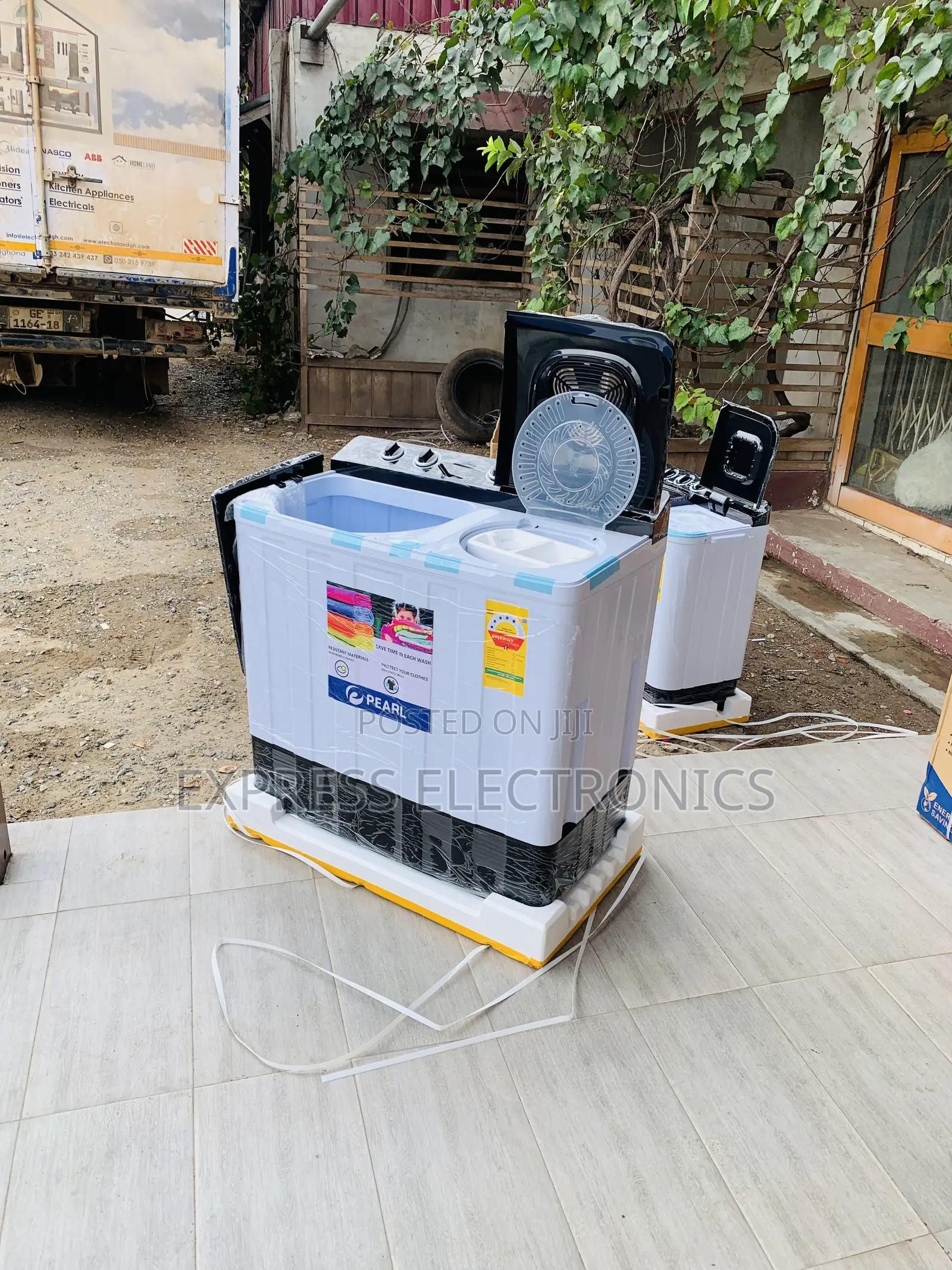Text Us Pearl 11kg Twin-Tub Semi-Washing Machine in White and Black.