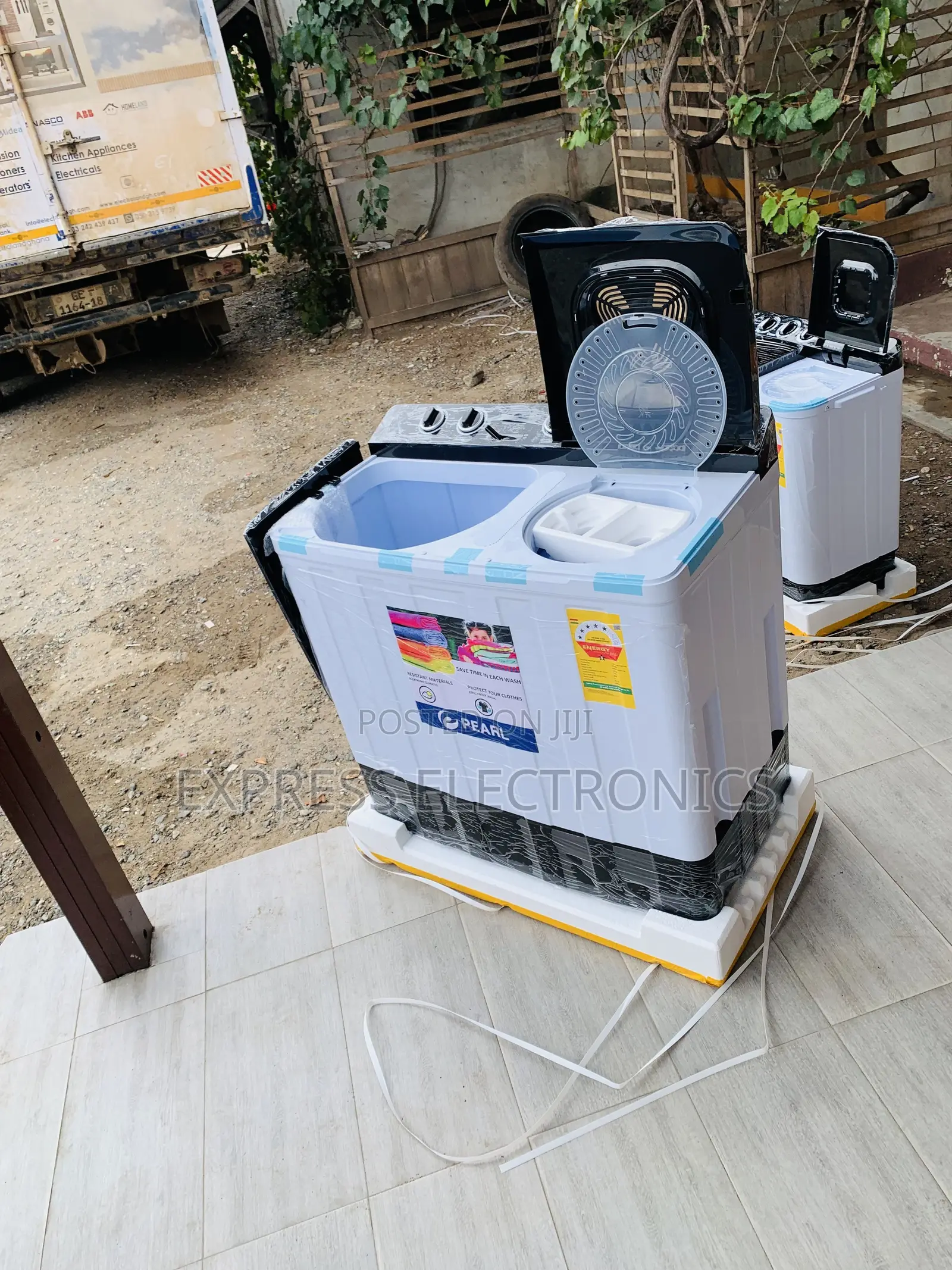 Limited Stock Pearl 11kg Twin-Tub Washing Machine in White and Black.