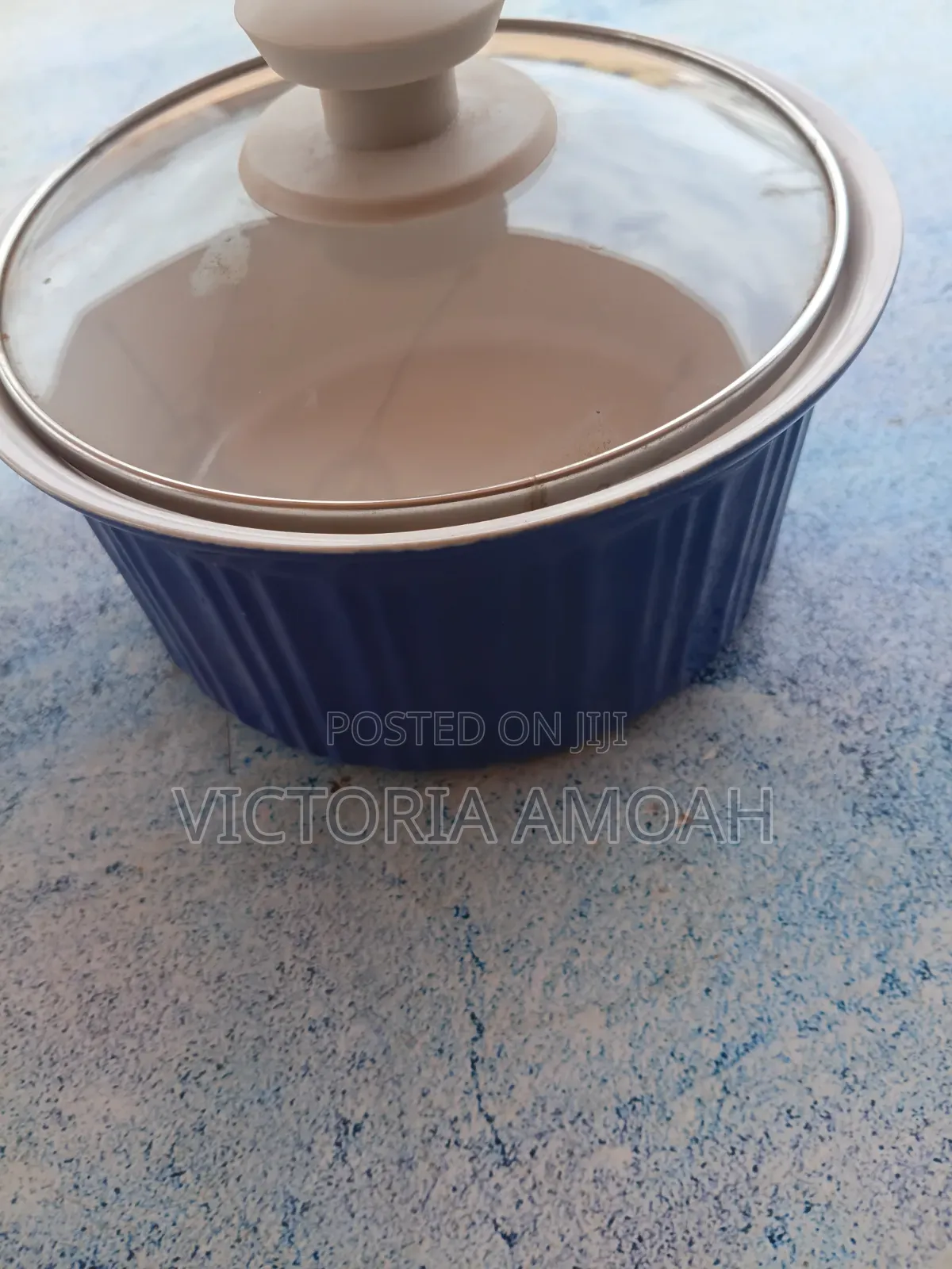 A Glossy Blue Ceramic Ramekin.