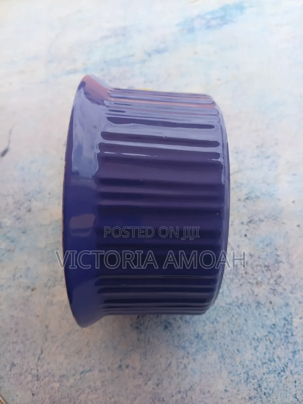 A Glossy Blue Ceramic Ramekin.