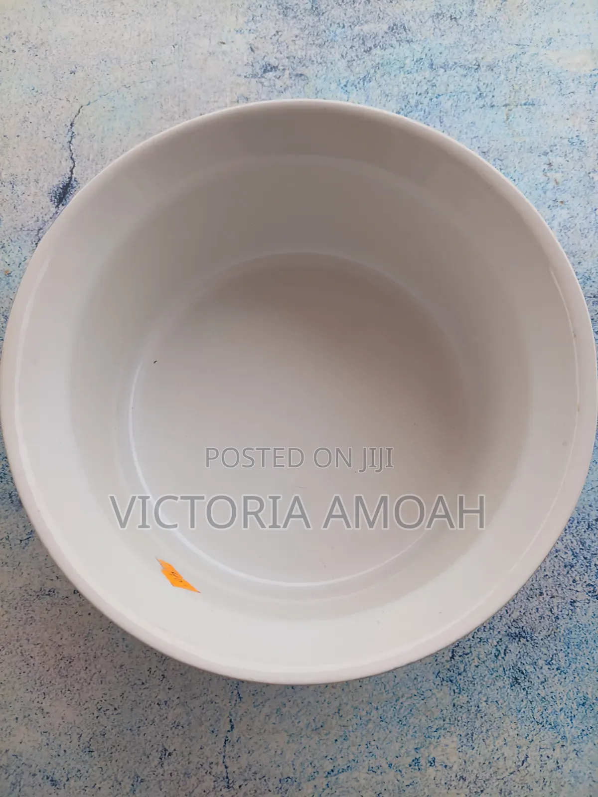 A Glossy Blue Ceramic Ramekin.