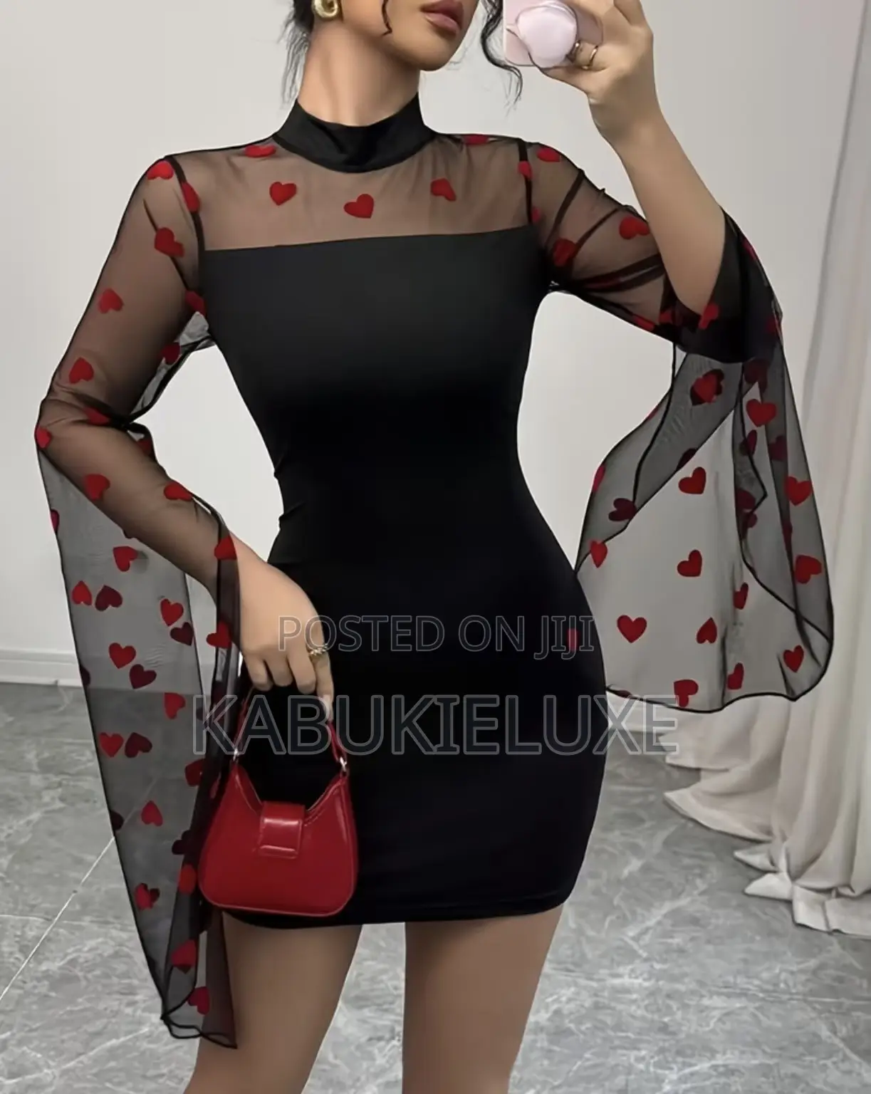 Elegant Black Bodycon Mini Dress With Heart Mesh Sleeves