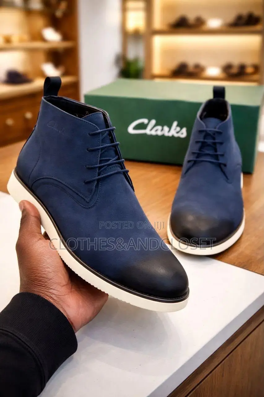 Clarks Men's Lace-Up Boots Finished in a Striking Navy Blue Leather