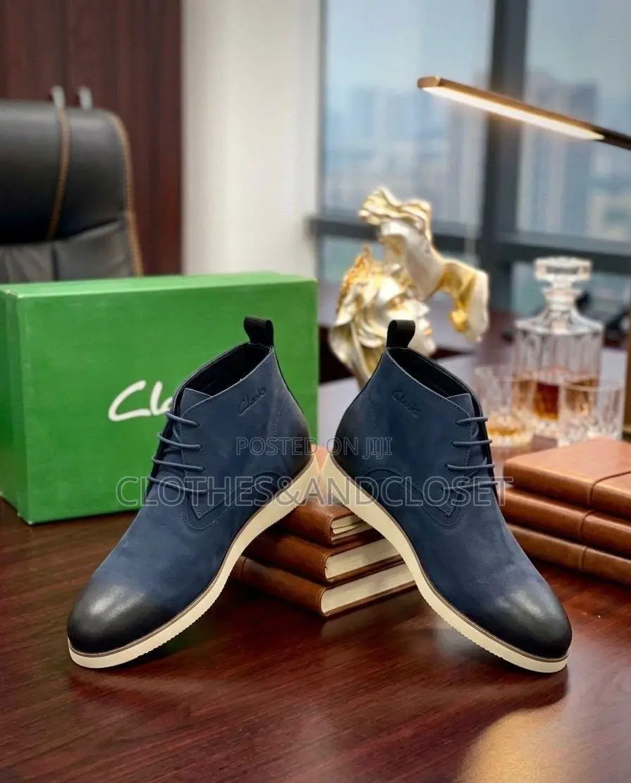 Clarks Men's Lace-Up Boots Finished in a Striking Navy Blue Leather