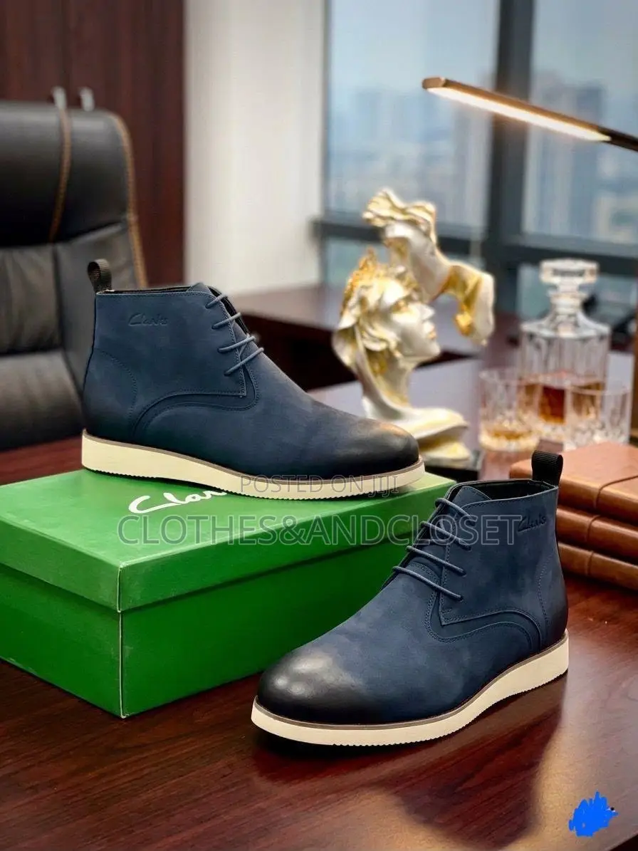 Clarks Men's Lace-Up Boots Finished in a Striking Navy Blue Leather