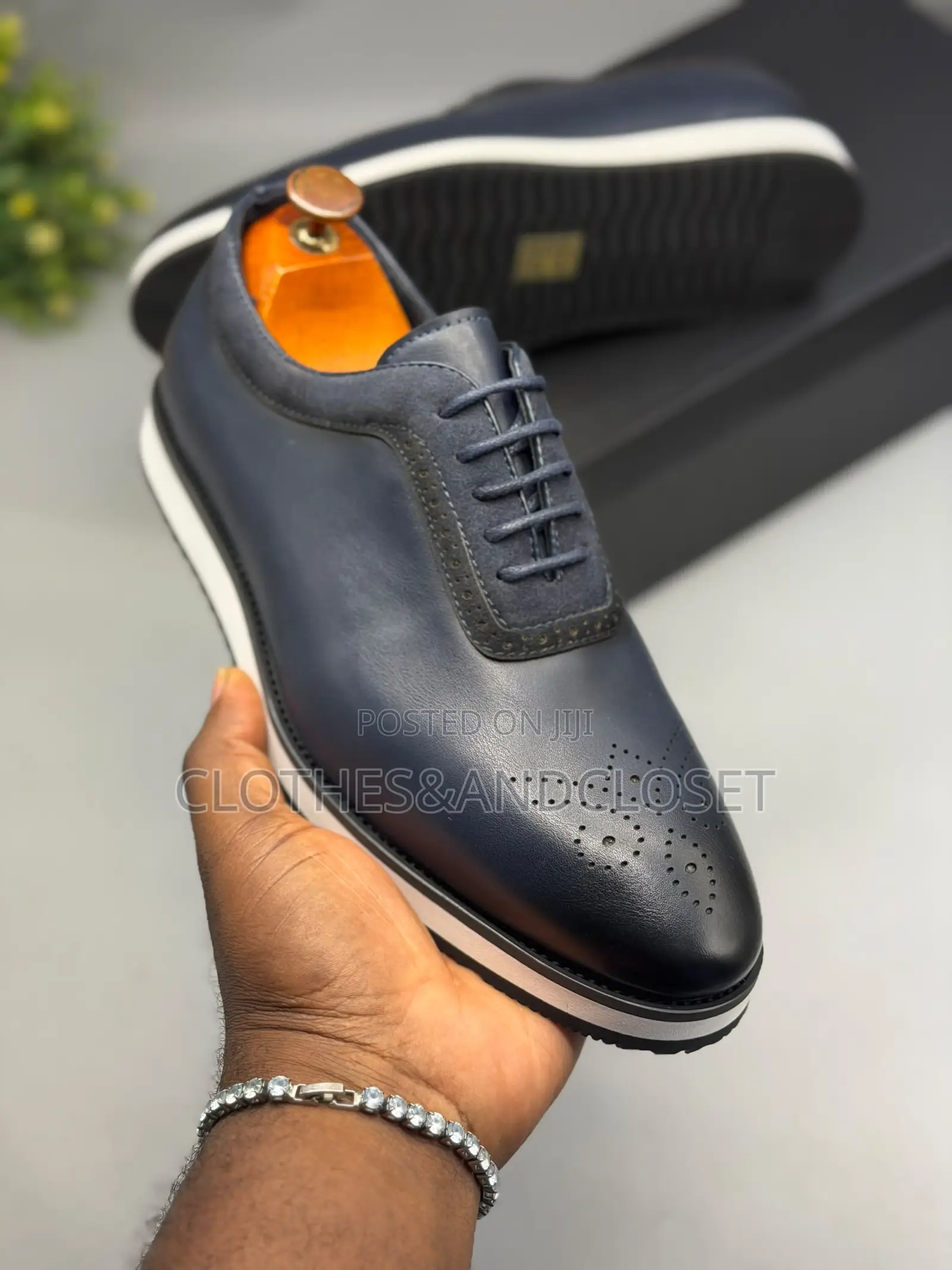 A Pair of Navy Blue Leather Men's Easywear Shoes