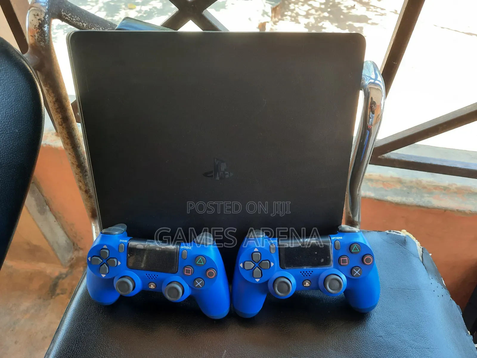 PS4 SLIM + 2 CONTROLLERS and 8 GAMES