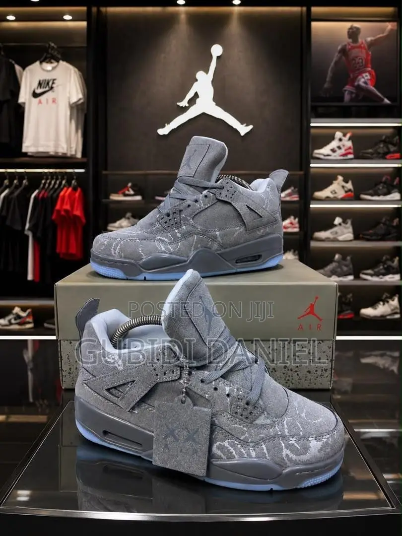 KAWS X Air Jordan 4 Retro 'Cool Grey