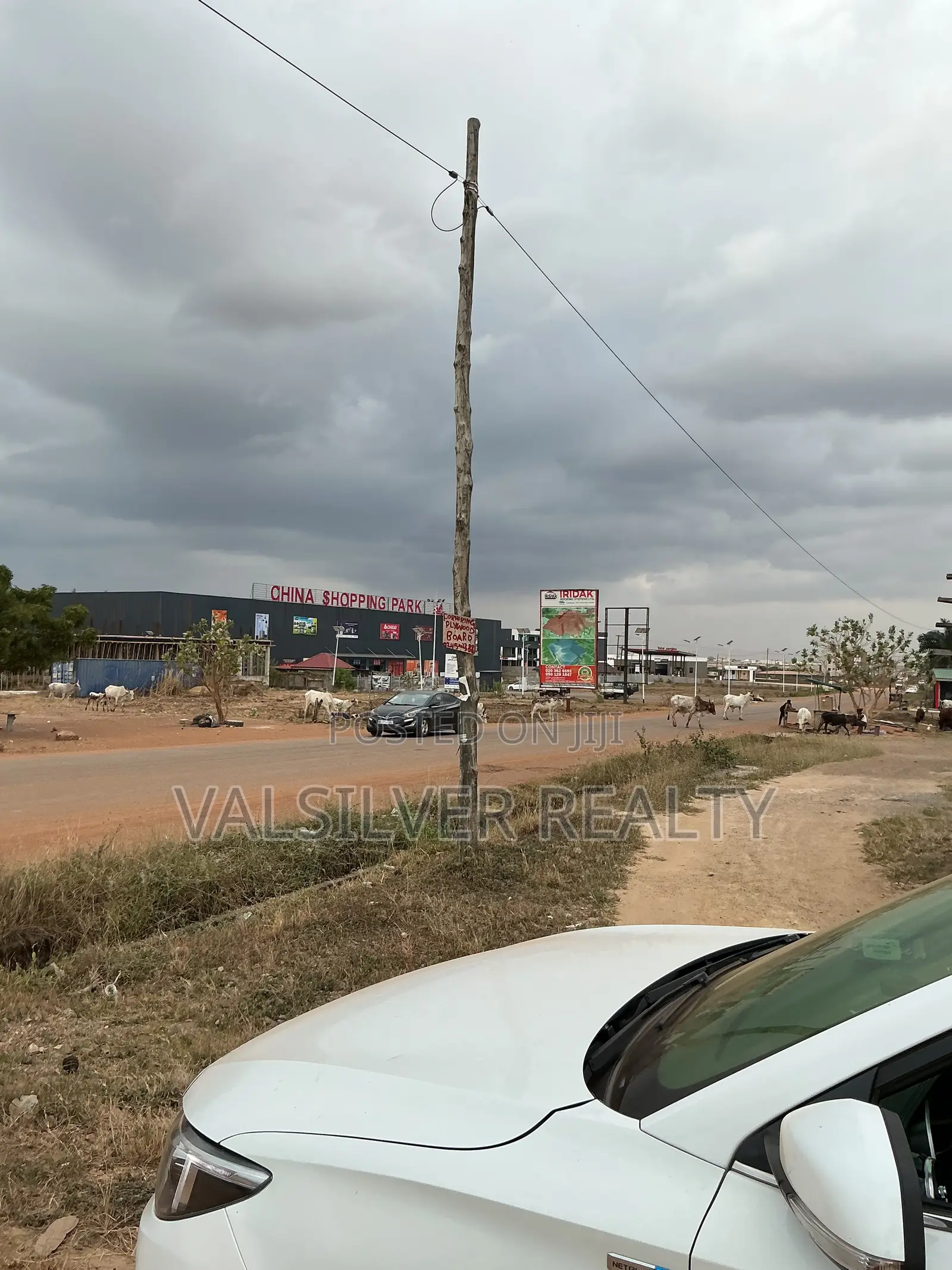 Titled 1 Plot With Uncompleted Building by the Road for Sale