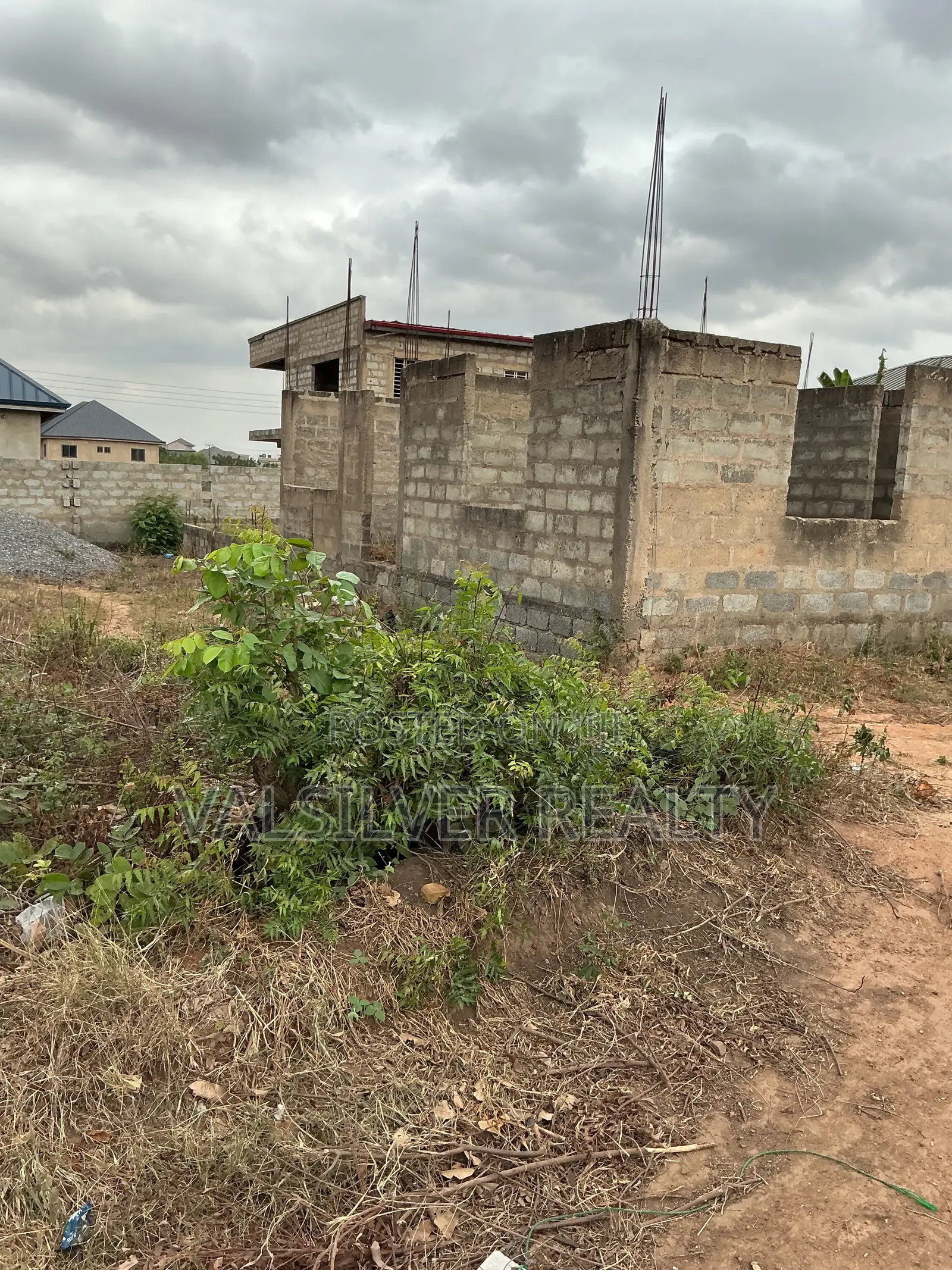 Titled 1 Plot With Uncompleted Building by the Road for Sale