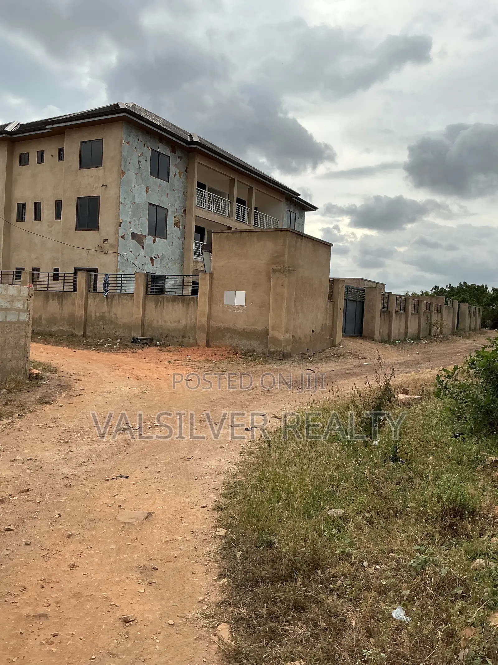 Titled 1 Plot With Uncompleted Building by the Road for Sale