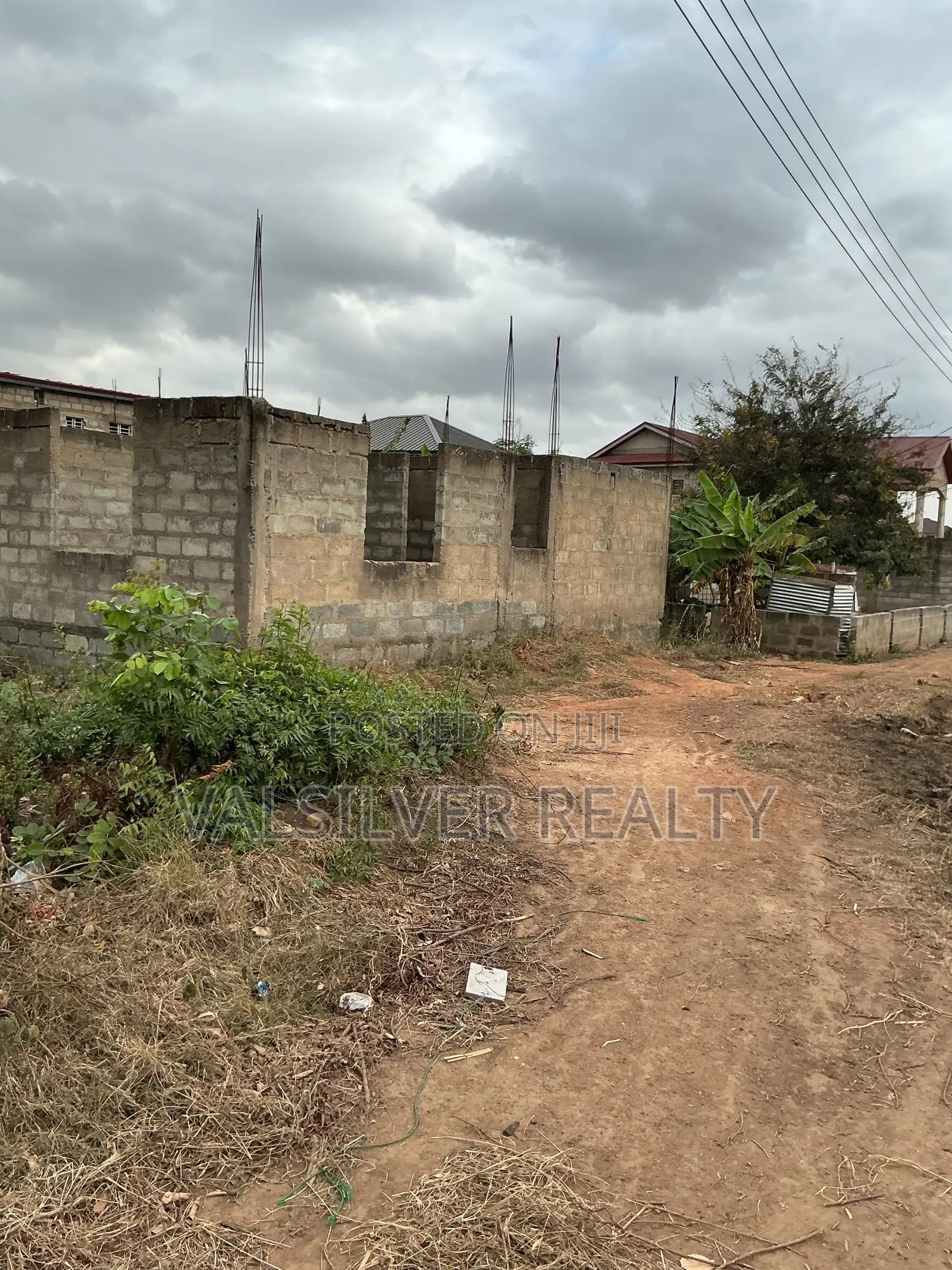Titled 1 Plot With Uncompleted Building by the Road for Sale