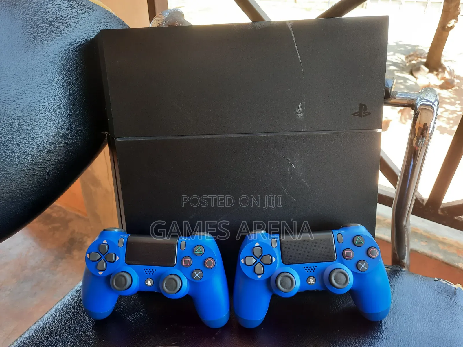 Ps4 Standard With FC 27 and 7 Other Games + 2 Controllers
