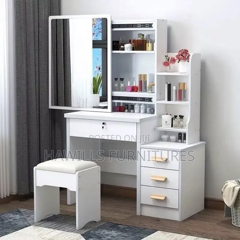 Modern White Dressing Vanity Set Featuring a Sliding Mirror.