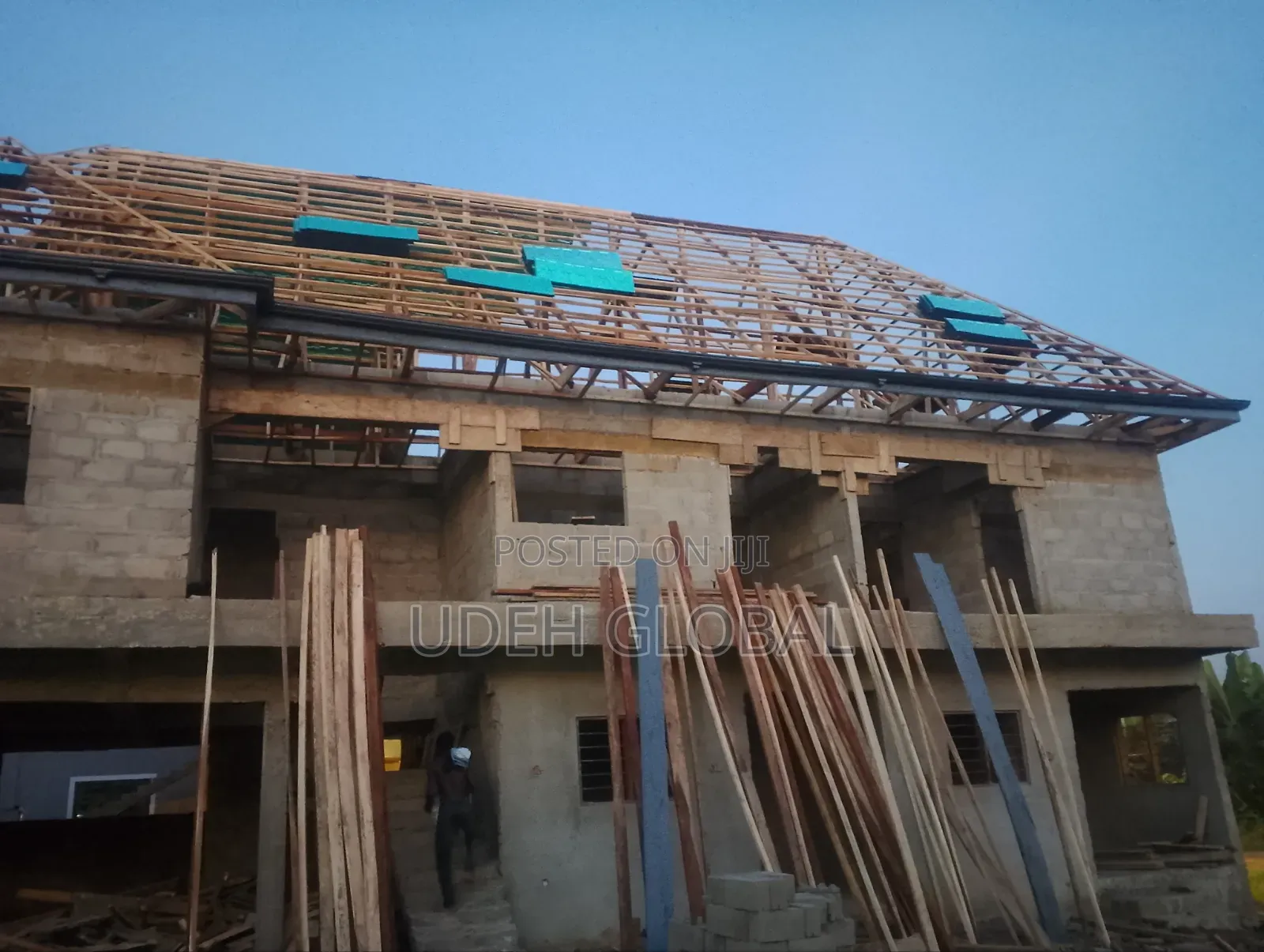 Wood Work and Euro Tile's Roofing Sheets and Rain Gutters Installation